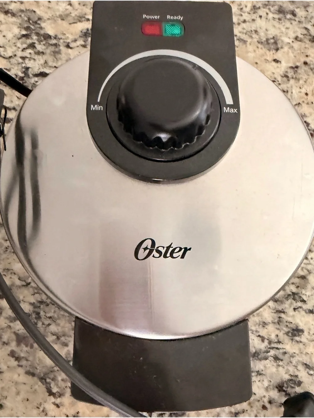 Oster Black Round 4-Section Nonstick Waffle Maker